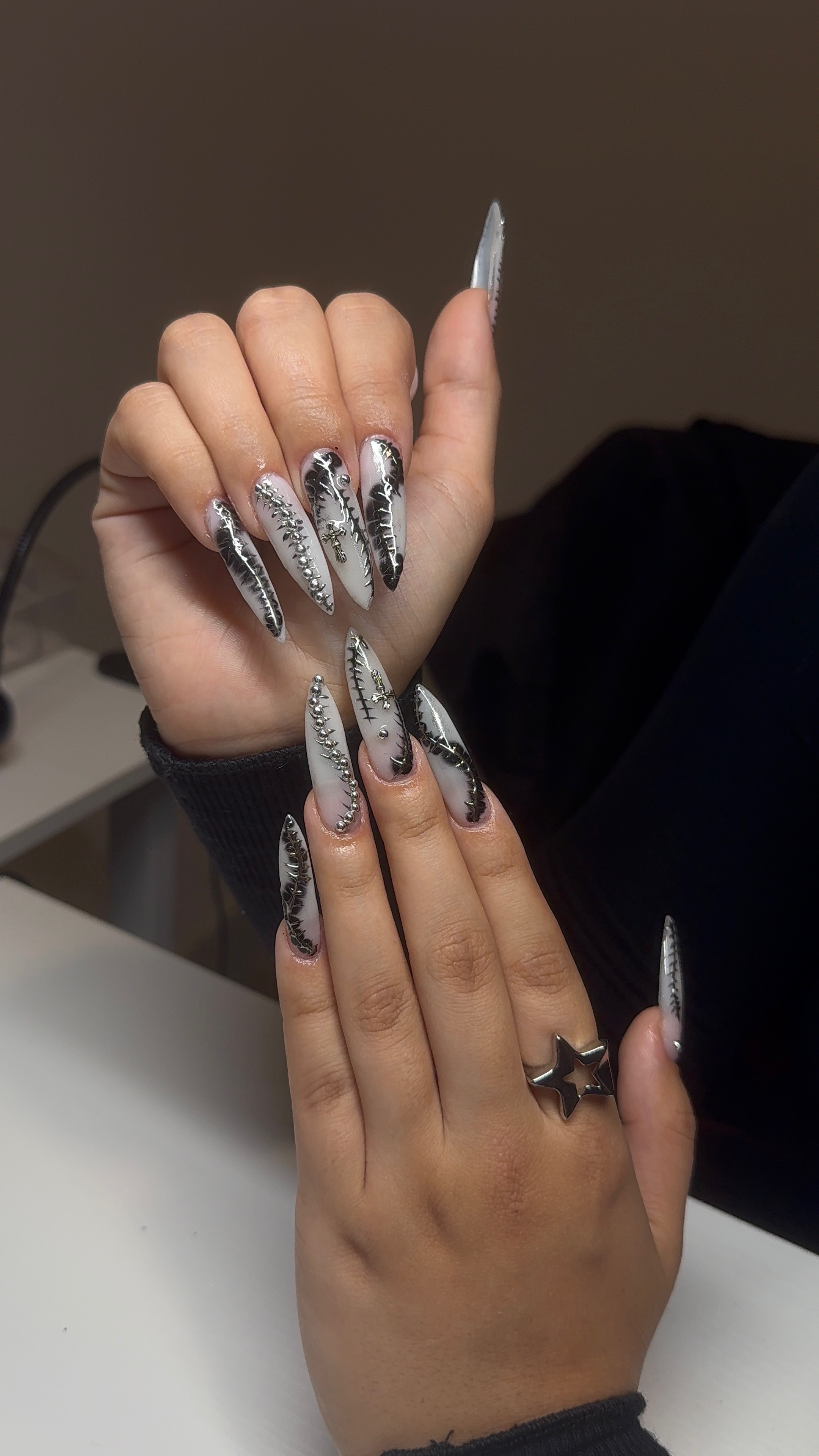 Dark gothic stiletto nails with thorns and rhinestones
