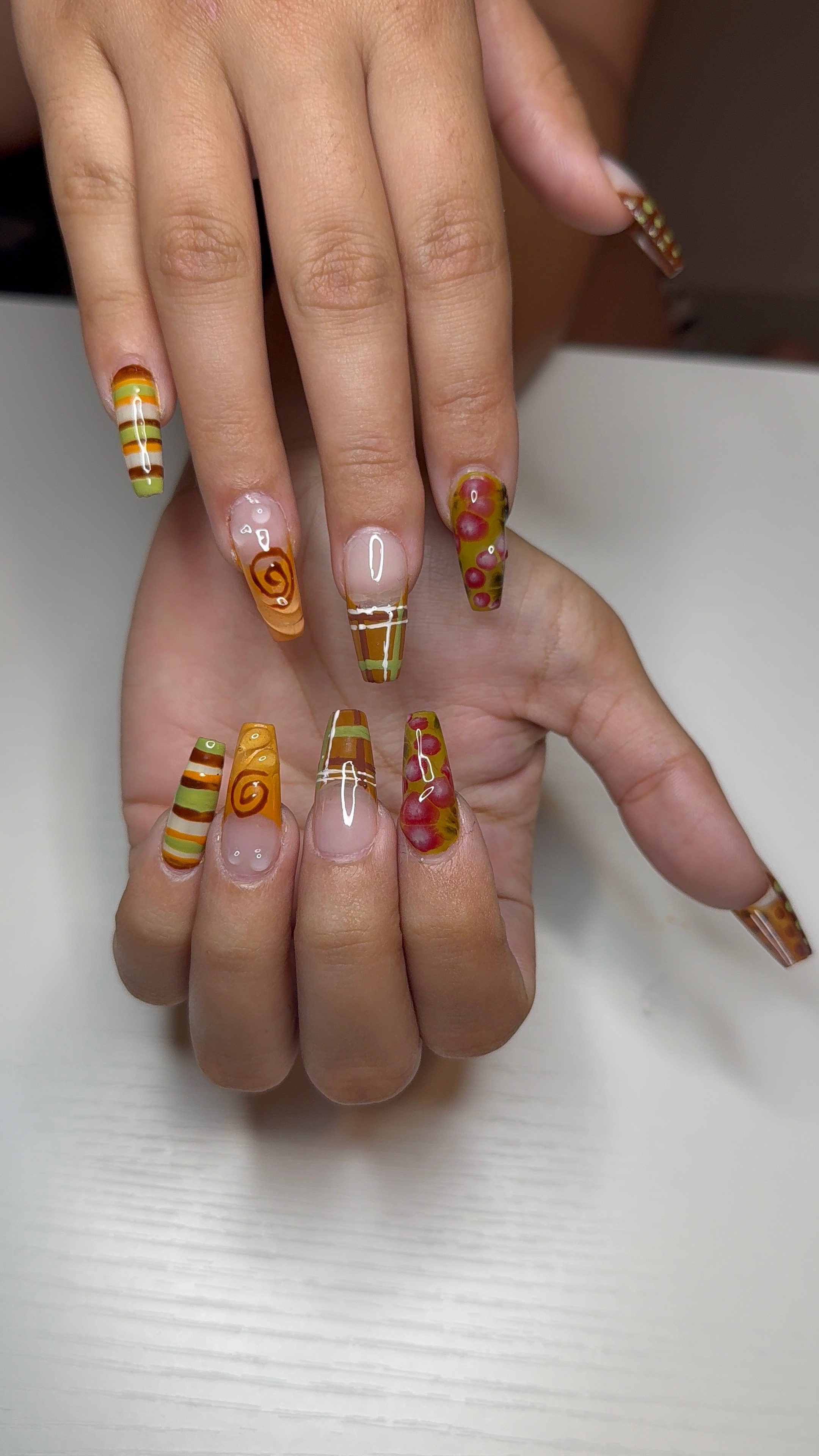Earth tone fall nail art with florals